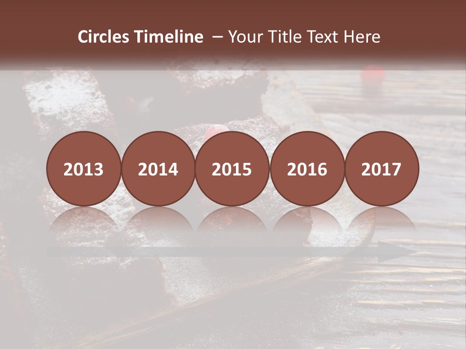 A Plate Of Brownies With Cherries On A Wooden Table PowerPoint Template