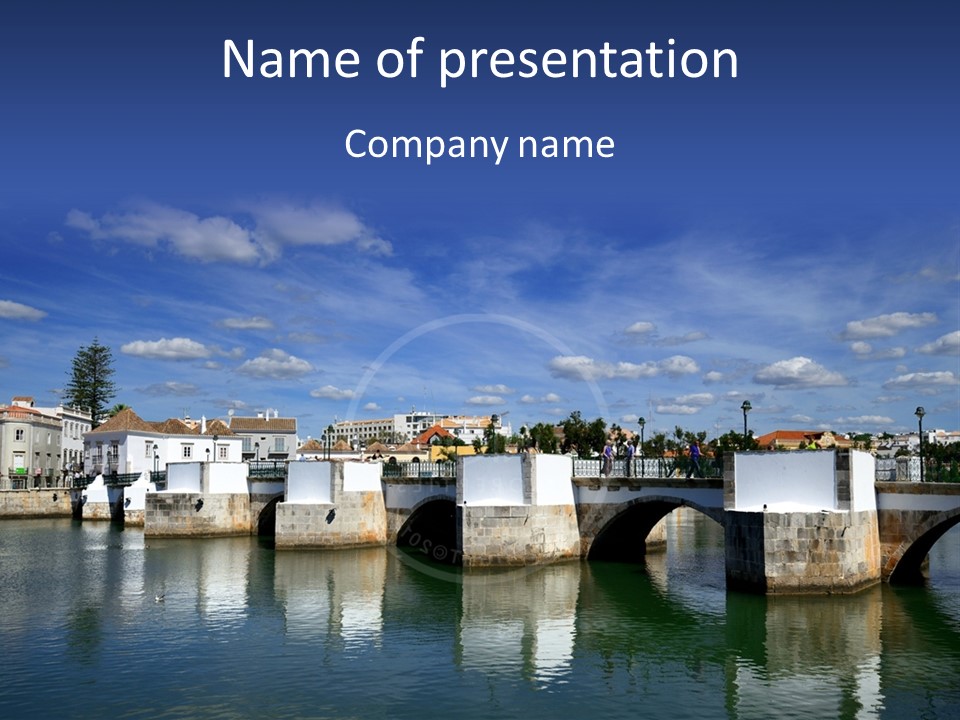 A Bridge Over A Body Of Water With Buildings In The Background PowerPoint Template