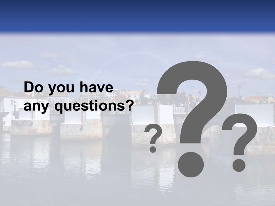 A Bridge Over A Body Of Water With Buildings In The Background PowerPoint Template