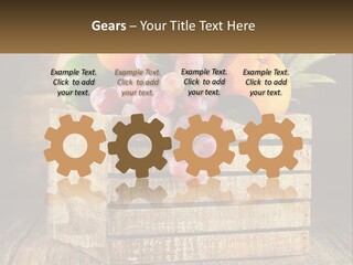 A Wooden Crate Filled With Fruit On Top Of A Wooden Table PowerPoint Template
