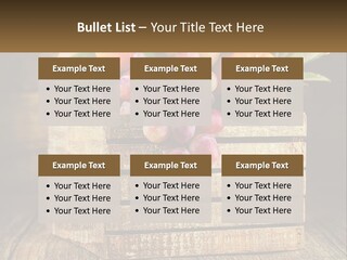 A Wooden Crate Filled With Fruit On Top Of A Wooden Table PowerPoint Template