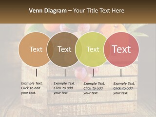 A Wooden Crate Filled With Fruit On Top Of A Wooden Table PowerPoint Template