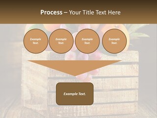 A Wooden Crate Filled With Fruit On Top Of A Wooden Table PowerPoint Template