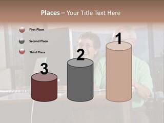 A Man And A Woman Sitting In Front Of A Computer PowerPoint Template