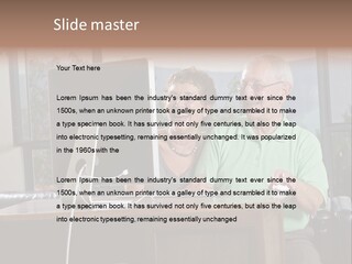 A Man And A Woman Sitting In Front Of A Computer PowerPoint Template