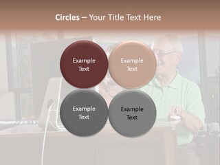 A Man And A Woman Sitting In Front Of A Computer PowerPoint Template