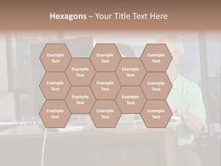 A Man And A Woman Sitting In Front Of A Computer PowerPoint Template