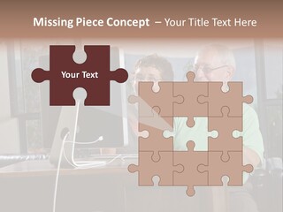 A Man And A Woman Sitting In Front Of A Computer PowerPoint Template