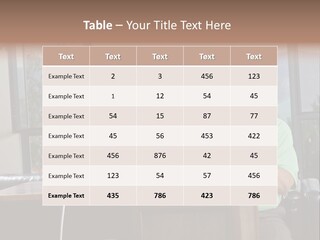 A Man And A Woman Sitting In Front Of A Computer PowerPoint Template