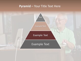 A Man And A Woman Sitting In Front Of A Computer PowerPoint Template