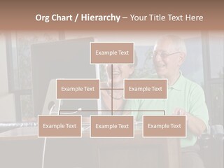 A Man And A Woman Sitting In Front Of A Computer PowerPoint Template