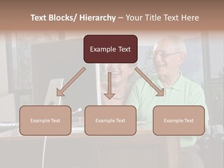 A Man And A Woman Sitting In Front Of A Computer PowerPoint Template