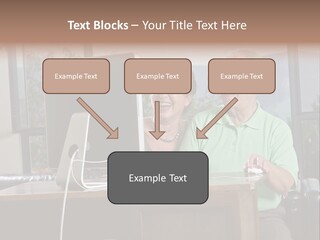 A Man And A Woman Sitting In Front Of A Computer PowerPoint Template