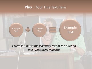 A Man And A Woman Sitting In Front Of A Computer PowerPoint Template