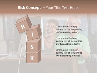 A Man And A Woman Sitting In Front Of A Computer PowerPoint Template