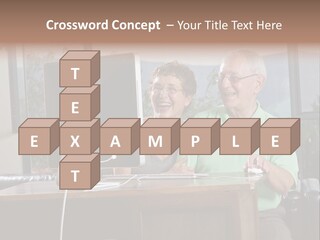 A Man And A Woman Sitting In Front Of A Computer PowerPoint Template