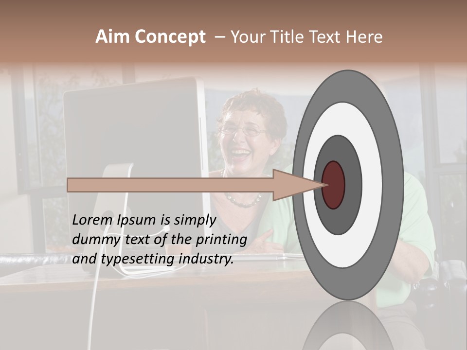 A Man And A Woman Sitting In Front Of A Computer PowerPoint Template