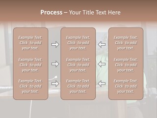 A Man And A Woman Sitting In Front Of A Computer PowerPoint Template