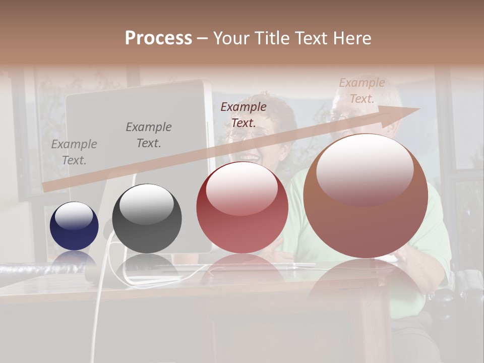 A Man And A Woman Sitting In Front Of A Computer PowerPoint Template