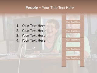 A Man And A Woman Sitting In Front Of A Computer PowerPoint Template