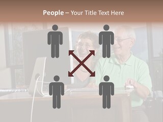 A Man And A Woman Sitting In Front Of A Computer PowerPoint Template