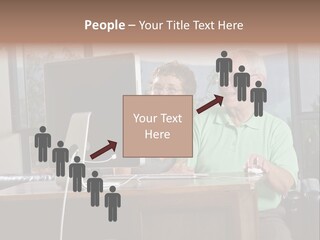 A Man And A Woman Sitting In Front Of A Computer PowerPoint Template