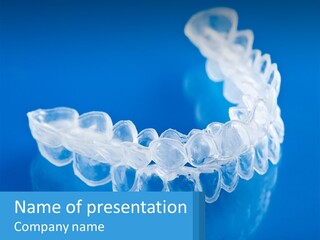 A Clear Plastic Toothbrush Holder On A Blue Background PowerPoint Template