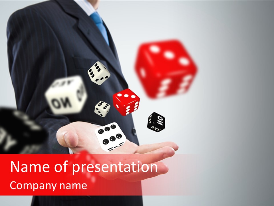 A Man In A Suit Is Holding A Dice PowerPoint Template