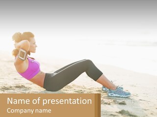 A Woman Is Doing A Plank On The Beach PowerPoint Template