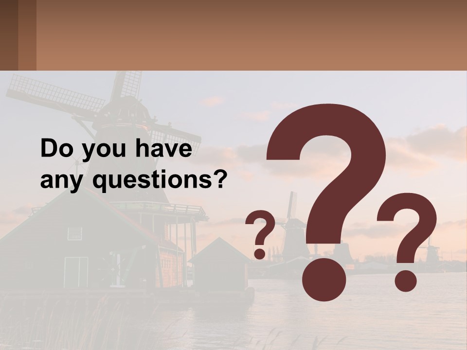 A Group Of Windmills Sitting Next To A Body Of Water PowerPoint Template