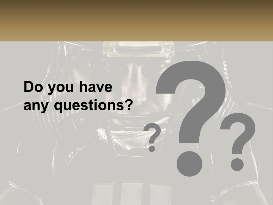 A Football Player Holding His Helmet Over His Face PowerPoint Template