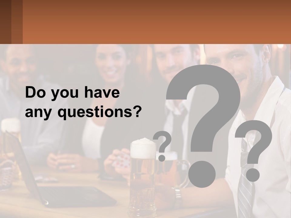 A Group Of People Sitting At A Table With Beer PowerPoint Template