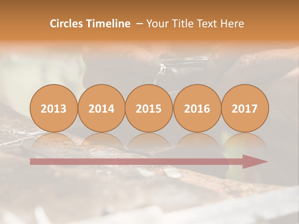 A Person Holding A Cell Phone In Their Hands PowerPoint Template