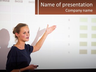 A Woman Standing In Front Of A Projection Screen Giving A Presentation PowerPoint Template