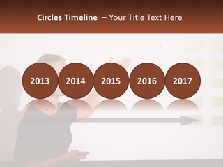 A Woman Standing In Front Of A Projection Screen Giving A Presentation PowerPoint Template