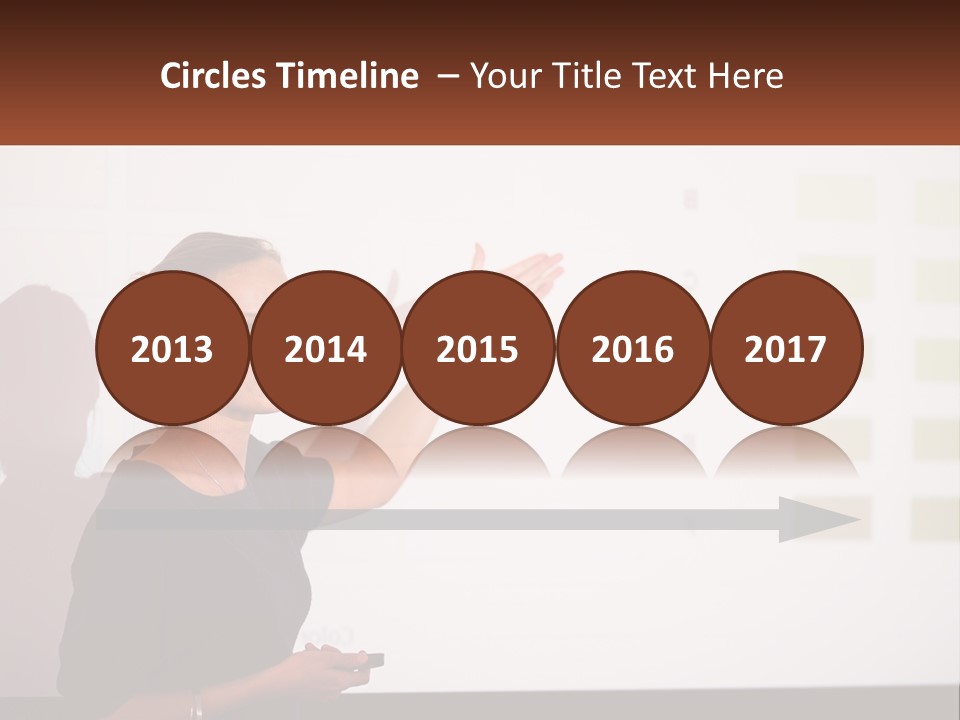 A Woman Standing In Front Of A Projection Screen Giving A Presentation PowerPoint Template