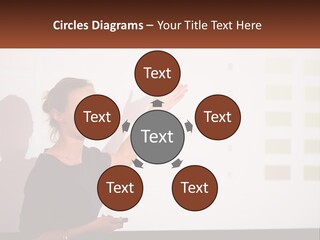 A Woman Standing In Front Of A Projection Screen Giving A Presentation PowerPoint Template