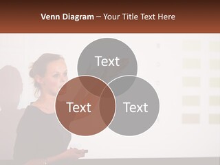A Woman Standing In Front Of A Projection Screen Giving A Presentation PowerPoint Template