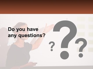 A Woman Standing In Front Of A Projection Screen Giving A Presentation PowerPoint Template