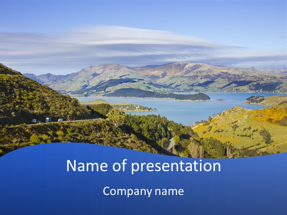 A Scenic View Of A Lake Surrounded By Mountains PowerPoint Template