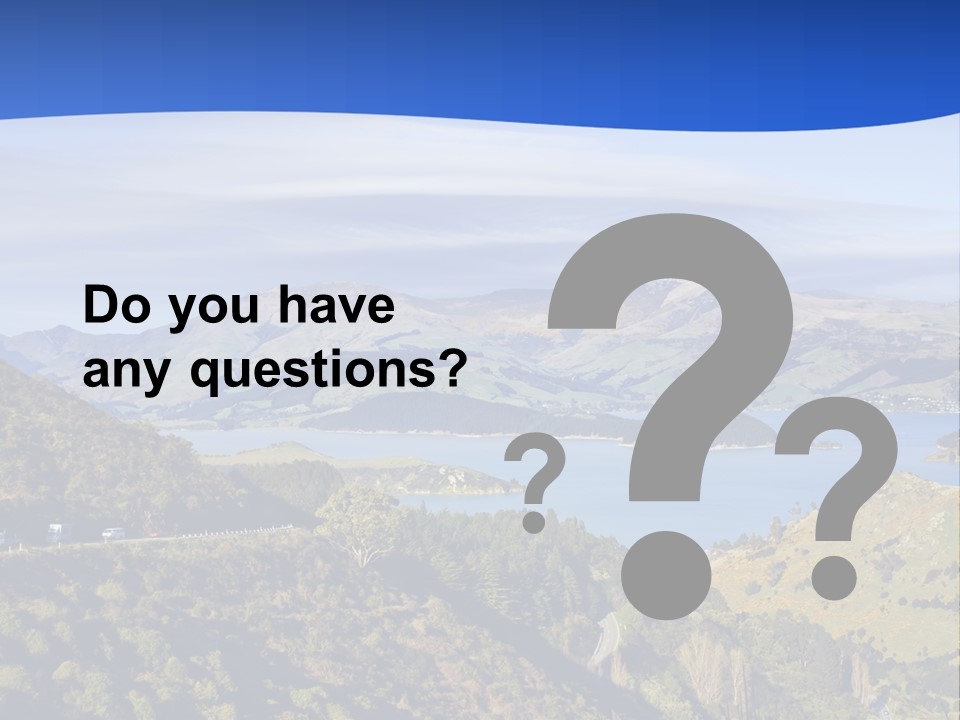 A Scenic View Of A Lake Surrounded By Mountains PowerPoint Template