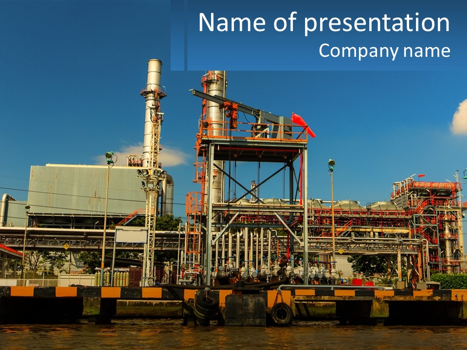A Power Plant Is Shown In This Powerpoint Presentation PowerPoint Template