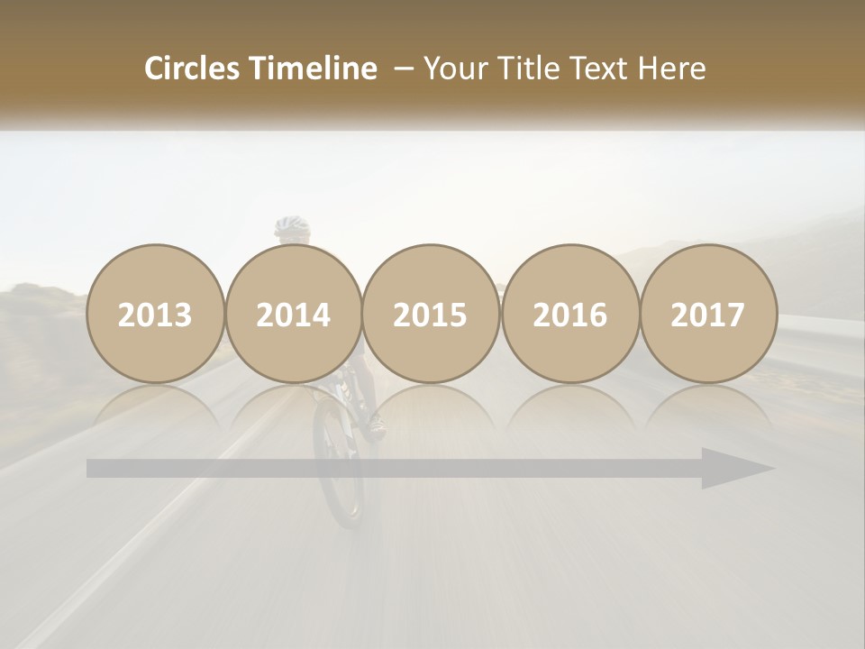 A Man Riding A Bike Down A Road PowerPoint Template