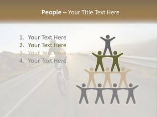 A Man Riding A Bike Down A Road PowerPoint Template
