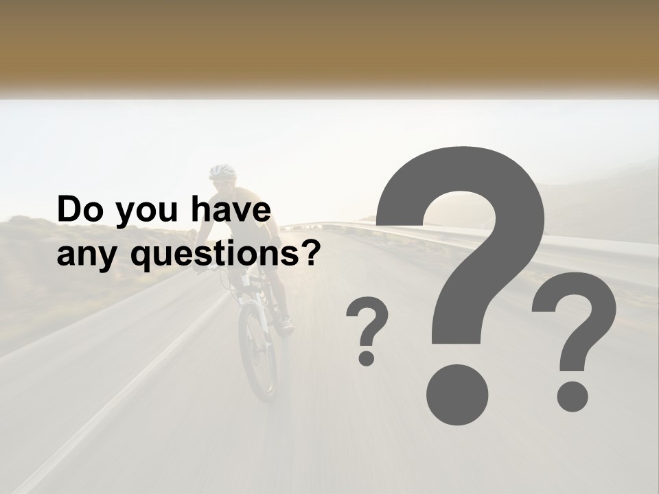 A Man Riding A Bike Down A Road PowerPoint Template