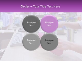 A Person Holding A Pink Object In Front Of A Computer PowerPoint Template