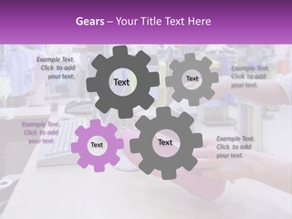 A Person Holding A Pink Object In Front Of A Computer PowerPoint Template