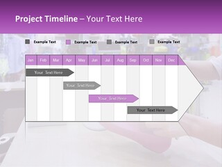 A Person Holding A Pink Object In Front Of A Computer PowerPoint Template