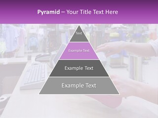 A Person Holding A Pink Object In Front Of A Computer PowerPoint Template