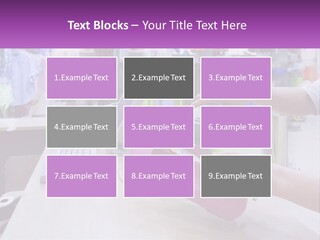 A Person Holding A Pink Object In Front Of A Computer PowerPoint Template